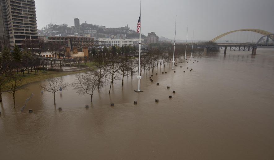 A view from the Central Bridge shows the flooding from the Ohio River  Saturday, Feb. 24, 2018 in Cincinnati.  Forecasters expected the Ohio River could reach levels not seen since the region&#39;s deadly 1997 floods.(Liz Dufour/The Cincinnati Enquirer via AP)