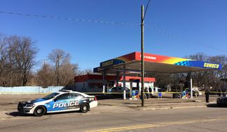 Two women and two men are dead after two shootings at a Sunoco gas station and in a nearby neighborhood on Detroit&#39;s west side, Monday, Feb. 26, 2018, police say. Police believe the shootings are connected. The first happened at about 8:40 a.m. Monday at the gas station on the corner of Fenkell and Beaverland near Telegraph. Jacqueline Pritchett, a commander of the Detroit Police Department&#39;s 8th Precinct, said investigators have identified the suspect and three of the victims.  (Charlie E. Ramirez/Detroit News via AP)