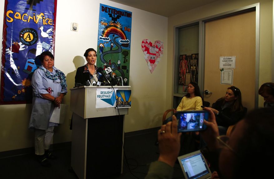 In this Sunday Feb. 25, 2018 photo, Oakland Mayor Libby Schaaf holds a press conference to address potential Immigration and Customs Enforcement activity in the area at Fruitvale Village in Oakland, Calif. In an unprecedented warning this weekend, Schaaf alerted residents of large-scale raids by ICE agents in the San Francisco Bay Area within 24 hours. Major arrests have not materialized, but Schaaf's message comes after months of criticism following her administration's decision to allow Oakland police to work with ICE agents on a raid, violating city policies. (Randy Vazquez/ Bay Area News Group via AP)
