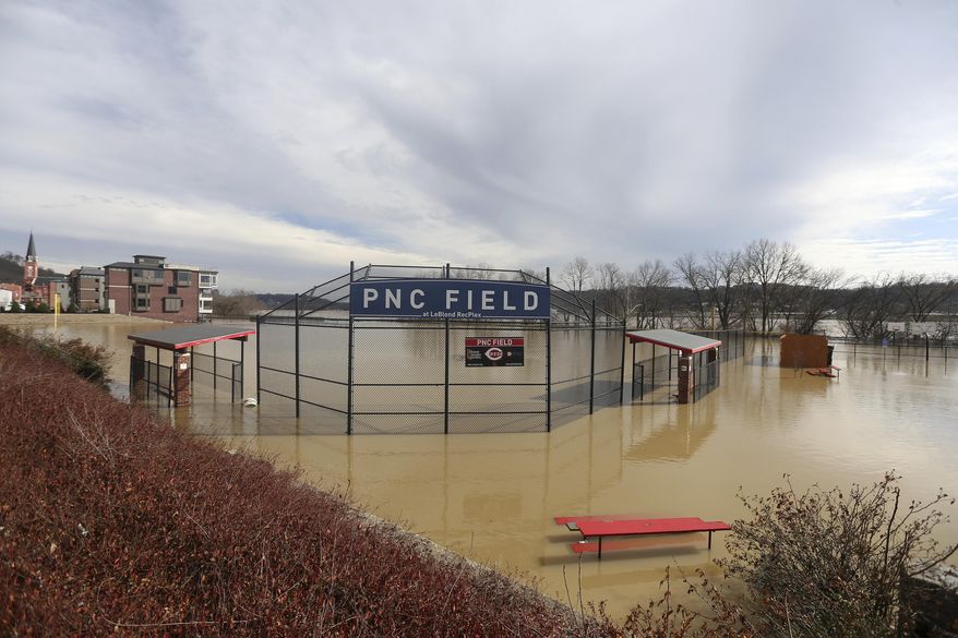 PNC Field is seen under water at the Le Blond Community Center in the East End, Sunday, Feb. 25, 2018. Heavy rains overnight have sent the swollen Ohio River to its highest point in 20 years with the river expected to remain above flood stage through the end of the week, a National Weather Service meteorologist said Sunday. (Kareem Elgazzar/The Cincinnati Enquirer via AP)