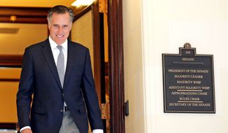 Mitt Romney leaves the Senate offices at the Utah State Capitol Tuesday, Feb. 27, 2018, in Salt Lake City. Romney held closed-door meetings with Utah lawmakers Tuesday as the former Republican presidential nominee continues his bid to become a U.S. Senator for Utah. (AP Photo/Rick Bowmer)