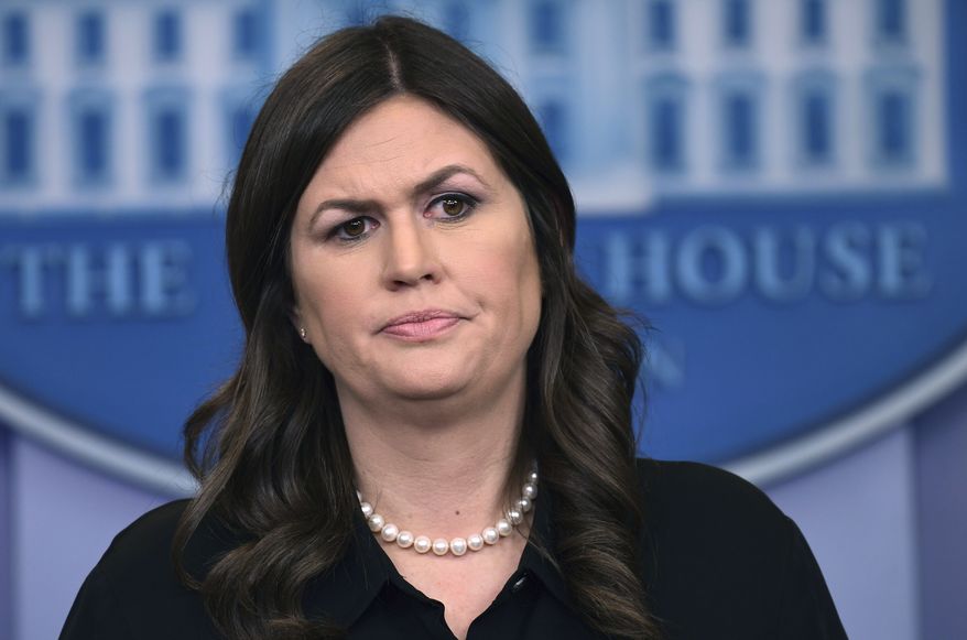 White House press secretary Sarah Huckabee Sanders speaks during the daily briefing at the White House in Washington, Wednesday, Jan. 24, 2018. Sanders was asked about the strength of the U.S. dollar, the recent school shootings and other topics. (AP Photo/Susan Walsh)