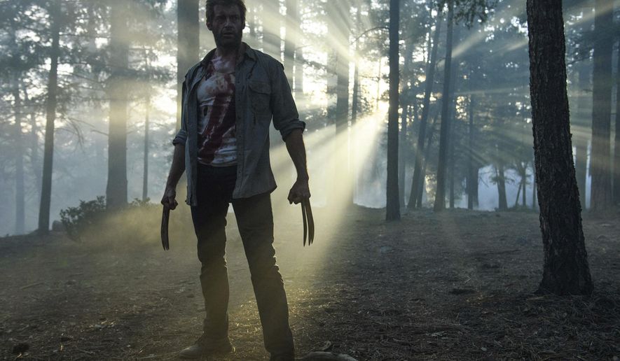 This image released by Twentieth Century Fox shows Hugh Jackman from the film, "Logan." Director James Mangold, along with Michael Green and Scott Frank, is nominated for an Oscar for adapted screenplay for the film. The 90th Academy Awards will be held on Sunday, March 4. (Ben Rothstein/Twentieth Century Fox via AP)
