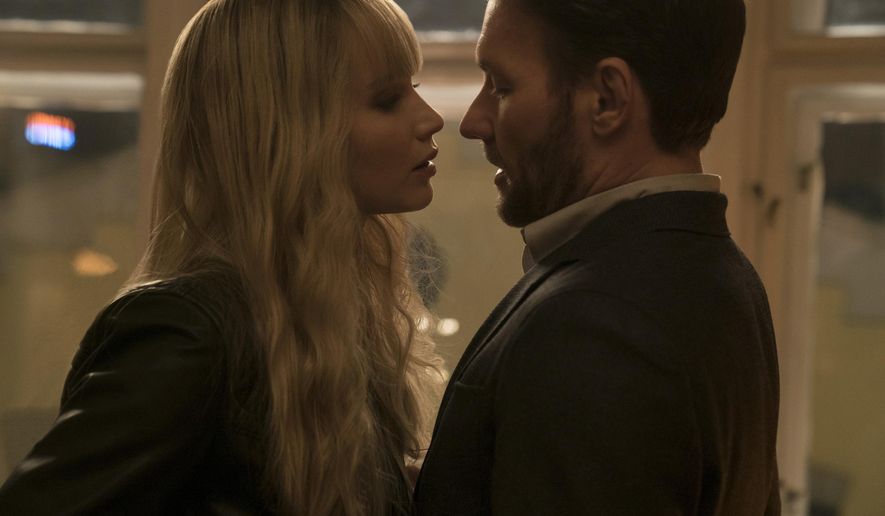 In this image released by Twentieth Century Fox, Jennifer Lawrence, left, and Joel Edgerton appear in a scene from "Red Sparrow." (Murray Close/Twentieth Century Fox via AP)