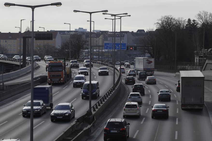 Cars drive on a high way through the city of Berlin, Germany, Tuesday, Feb. 27, 2018. A German court decides today on whether to allow a ban on diesel cars in cities to lower air pollution, a move that could have drastic consequences for the country's powerful auto industry. (AP Photo/Markus Schreiber)