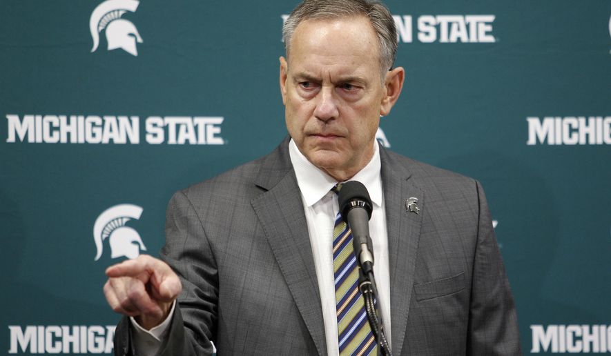 FILE - In this Jan. 26, 2018, file photo, Michigan State football coach Mark Dantonio addresses the media in East Lansing, Mich. Dantonio says he wants to be “a part of the solution” as both the school and his football program face ongoing questions about how sexual assault allegations have been handled. Dantonio spoke at the start of spring practice Tuesday, saying he hopes the community and university are healing. The campus has been rocked by the sex-abuse scandal involving disgraced doctor Larry Nassar, and the school’s president and athletic director resigned last month. (AP Photo/Al Goldis, File)