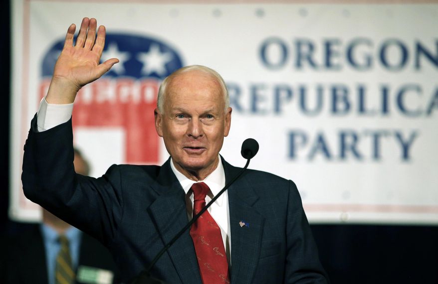 FILE - In this Nov. 8, 2016, file photo, Dennis Richardson, the Oregon Republican Secretary of state candidate, waves to the crowd during an election night event at the Salem Convention Center in Salem, Ore. The Republican-led office in charge of Oregon's elections is asking the Legislature to fund an internet security position to protect against foreign interference after the Russian government targeted the state in the 2016 elections. (AP Photo/Timothy J. Gonzalez, File)