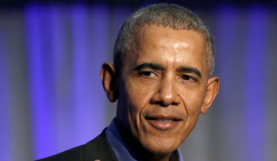 Former President Barack Obama address the participants at a summit on climate change involving mayors from around the globe in Chicago, Dec. 5, 2017. (AP Photo/Charles Rex Arbogast) ** FILE **