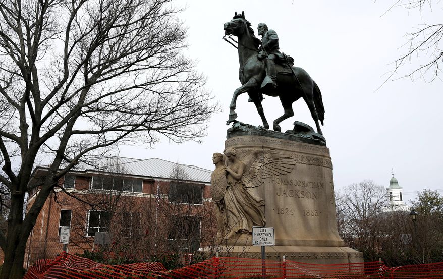 The statue of Robert E. Lee is seen uncovered in Emancipation Park in Charlottesville, Va., on Wednesday, Feb. 28, 2018. (Zack Wajsgras/The Daily Progress via AP)