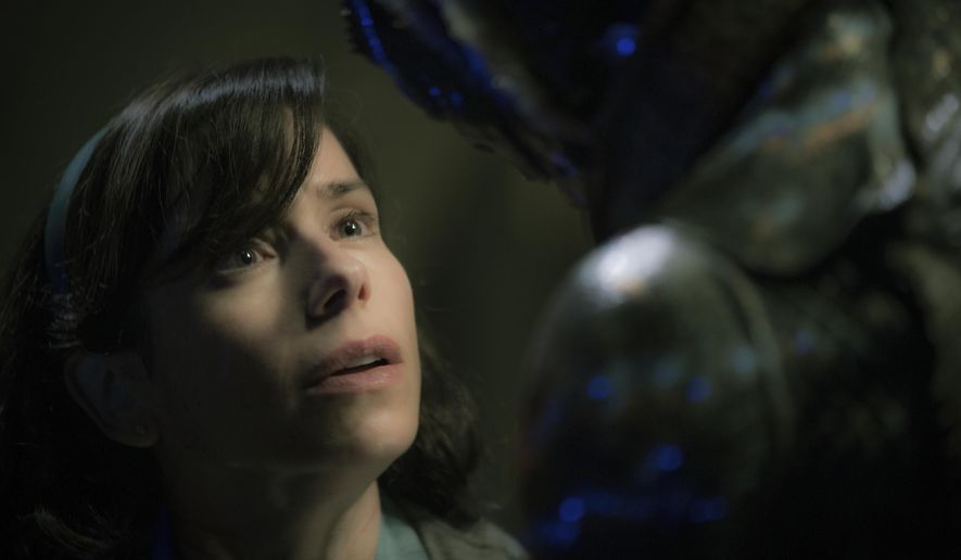 FILE - This image released by Fox Searchlight Pictures shows Sally Hawkins, left, and Doug Jones in a scene from the film "The Shape of Water," which is nominated for an Oscar for best picture. (Kerry Hayes/Fox Searchlight Pictures via AP, File)