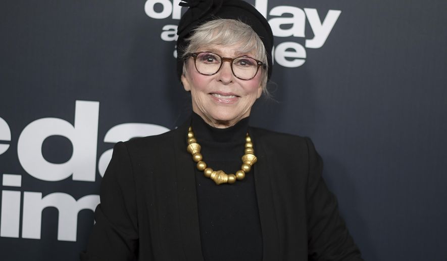 FILE - In this Jan. 24, 2018 file photo, Rita Moreno attends the Los Angeles premiere of "One Day at a Time" Season 2 at ArcLight Hollywood in Los Angeles. Moreno, Sandra Bullock, Dave Chappelle, Christopher Walken, and Helen Mirren are among the latest slate of stars set to appear on the 90th Academy Awards. Oscar telecast producers revealed another round of celebrity presenters on Tuesday, Feb. 17, 2018, which also includes Jane Fonda, Matthew McConaughey, Lupita Nyong’o, Nicole Kidman, Jodie Foster, Ashley Judd and Eugenio Derbez. (Photo by Richard Shotwell/Invision/AP, File)