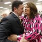 State Sen. Chris McDaniel, R-Ellisville, is greeted by his wife, Jill McDaniel, prior to announcing his candidacy to the U.S. Senate, Wednesday, Feb. 28, 2018 in Ellisville, Miss. McDaniel tried unsuccessfully to unseat U.S. Sen. Thad Cochran, R-Miss., in 2014. He will now challenge current Republican U.S. Sen. Roger Wicker. (AP Photo/Rogelio V. Solis)