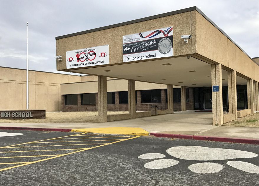 In this Feb. 24, 2018, photo, the main entrance of Dalton High School is shown, in Dalton, Ga. (AP Photo/Jeff Martin)