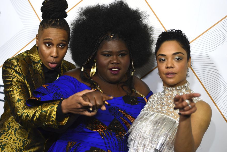 Lena Waithe, from left, Gabourey Sidibe and Tessa Thompson attend the 11th Annual Essence Black Women in Hollywood Awards Luncheon on Thursday, March 1, 2018 in Beverly Hills, Calif. (Photo by Jordan Strauss/Invision/AP)