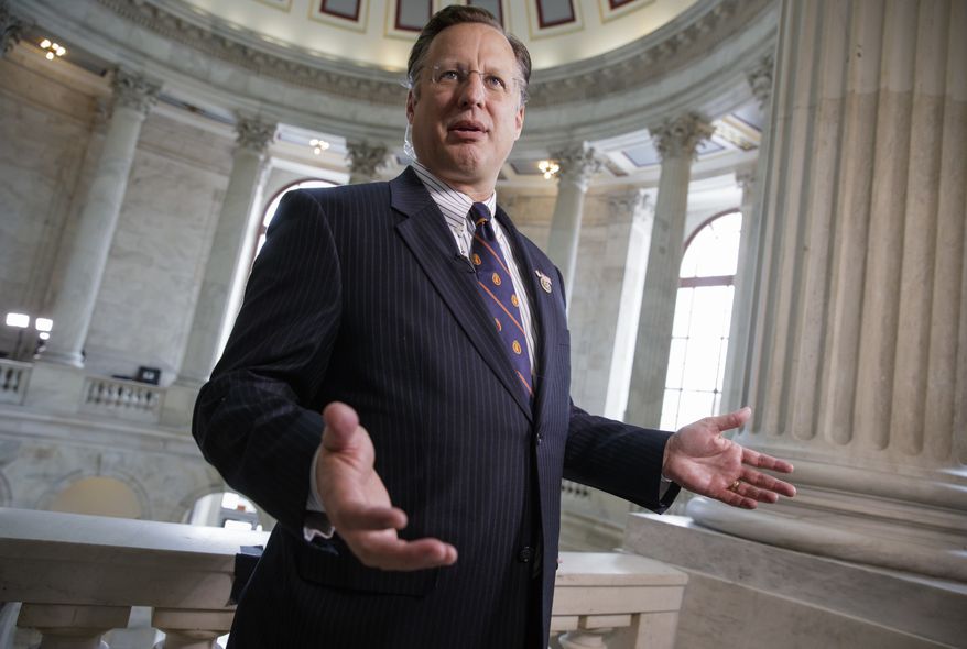 Rep. Dave Brat R-Va. talks to reporters on Capitol Hill in Washington, Wednesday, March, 15, 2017. Brat, who ousted House Majority Leader Eric Cantor in 2014, is a conservative member of the House Freedom Caucus, which is opposed to the GOP health care bill embraced by Speaker Paul Ryan. (AP Photo/J. Scott Applewhite)