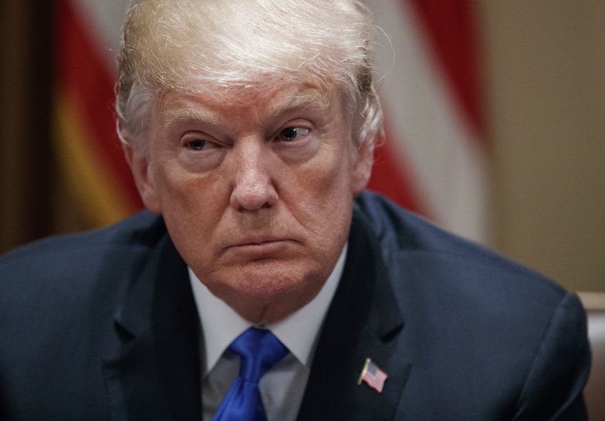 In this Feb. 28, 2018 photo, President Donald Trump pauses during a meeting in the Cabinet Room of the White House, in Washington, with members of congress to discuss school and community safety. A White House official says President Donald Trump plans to announce Thursday whether he'll impose tariffs or quotas on steel and aluminum imports. (AP Photo/Carolyn Kaster)