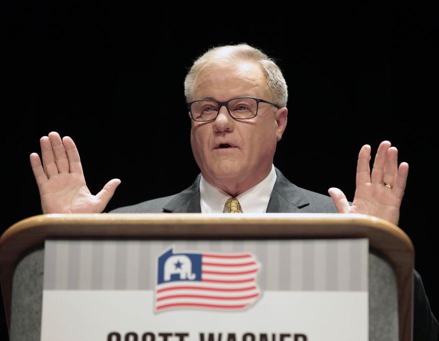 Scott Wagner, a York County state senator and the president of waste-hauler PennWaste Inc., answers questions from the panel during a debate between Republican Gubernatorial candidates at Harrisburg Area Community College in Harrisburg, Pa., Thursday, March 1, 2018. (AP Photo/Chris Knight)