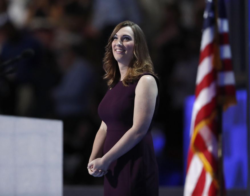 In this July 28, 2016, file photo, LGBT rights activist Sarah McBride takes the stage during the final day of the Democratic National Convention in Philadelphia. Activist groups are turning to television ads to pressure the White House into allowing transgender people to keep serving in the military. McBride, Human Rights Campaign's spokeswoman, said it's a "critical window of time" to take the fight directly to the White House. (AP Photo/Paul Sancya, File)