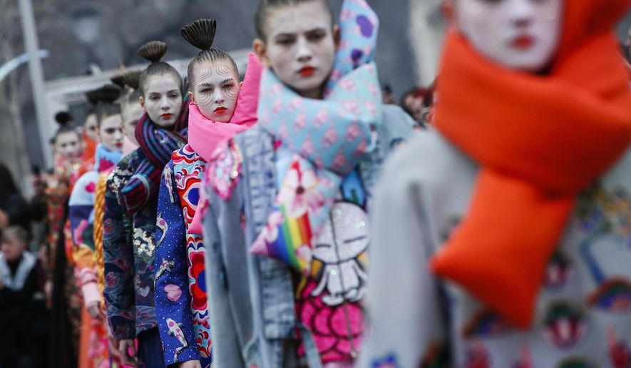 Models wear creations for Manish Arora&#39;s ready-to-wear fall/winter 2018/2019 fashion collection presented in Paris, Thursday, March 1, 2018. (AP Photo/Kamil Zihnioglu)