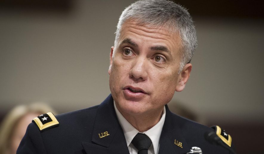 Army Lieutenant General Paul Nakasone appears before the Senate Armed Services Committee to discuss his qualifications as nominee to be National Security Agency Director and U.S. Cyber Command Commander, during a hearing on Capitol Hill in Washington, Thursday, March 1, 2018. (AP Photo/Cliff Owen)