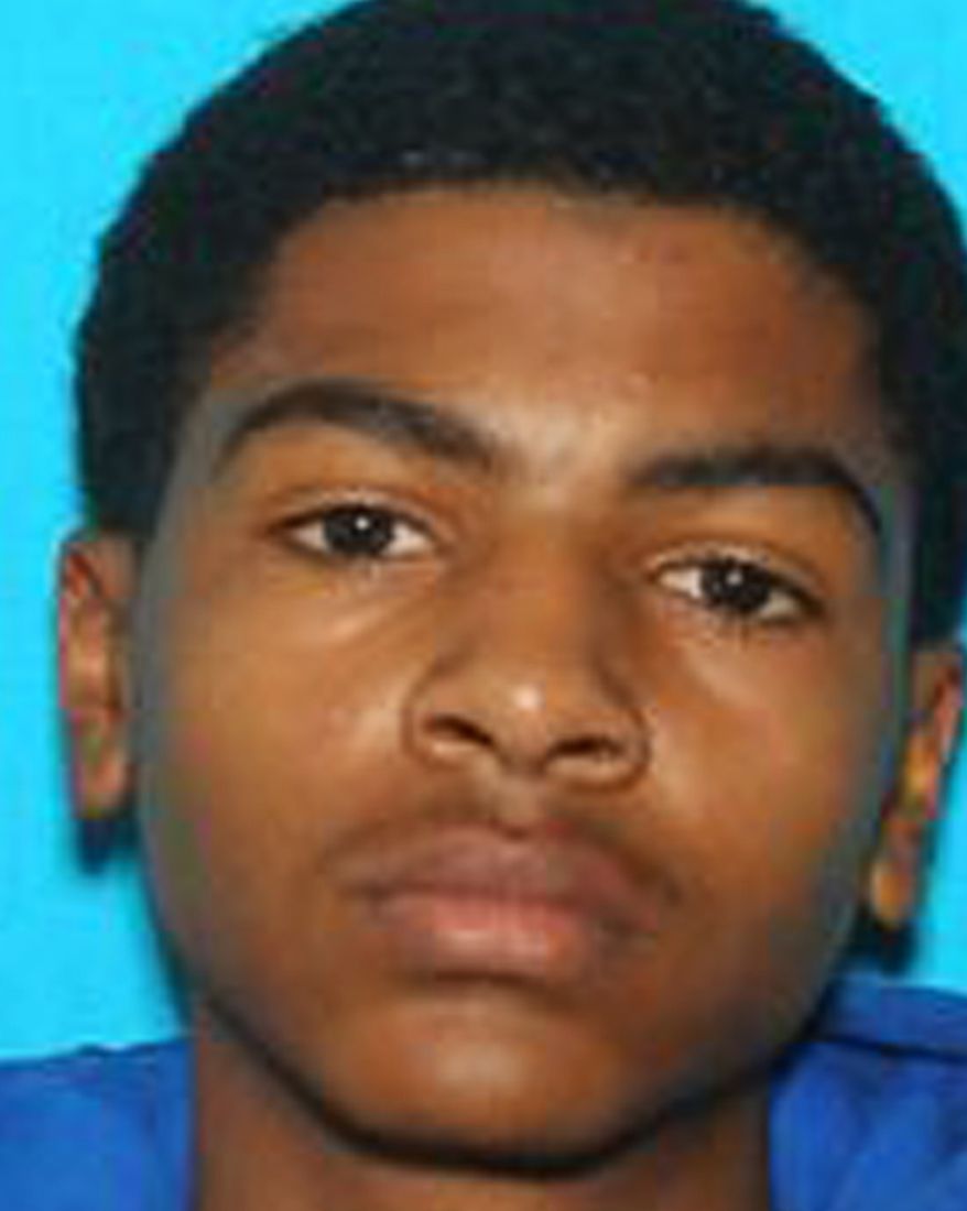 This undated photo provided by Central Michigan University shows James Eric Davis Jr., who police identified as the shooting suspect at a Central Michigan University residence hall on Friday, March 2, 2018. Investigators said neither victim was a student and described the shooting as a "family-type domestic situation." (Courtesy of Central Michigan University via AP)