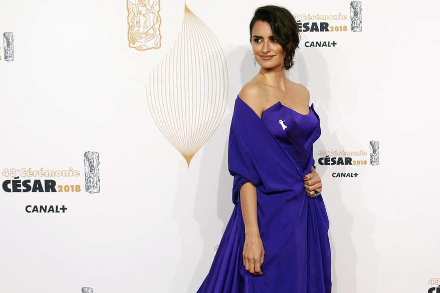 Actress Penelope Cruz arrives at the 43rd Cesar Film Awards ceremony at Salle Pleyel in Paris, Friday, March 2, 2018. France's movie industry holds its annual awards ceremony, with many stars at the Cesar Awards planning to wear a white ribbon to protest sexual misconduct. (AP Photo/Thibault Camus)