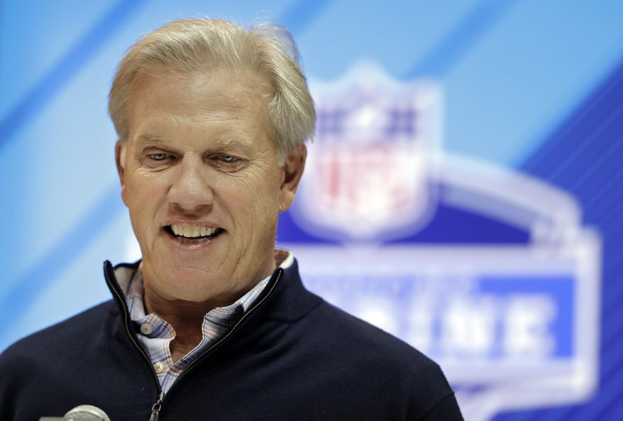 FILE - In this Wednesday, Feb. 28, 2018, file photo, Denver Broncos general manager John Elway speaks during a press conference at the NFL football scouting combine, in Indianapolis. Elway has found it difficult to land a franchise quarterback from the college ranks like he did in free agency with Peyton Manning six years ago. Last year, the Broncos cycled through his draft picks Brock Osweiler, Trevor Siemian and Paxton Lynch during the team's worst season in decades. (AP Photo/Darron Cummings, File)