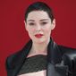 Actress Rose McGowan poses for photographers before the Andreas Kronthaler for Vivienne Westwood ready-to-wear fall/winter 2018/2019 fashion week runway show in Paris, Saturday, March 3, 2018. (Photo by Vianney Le Caer/Invision/AP)