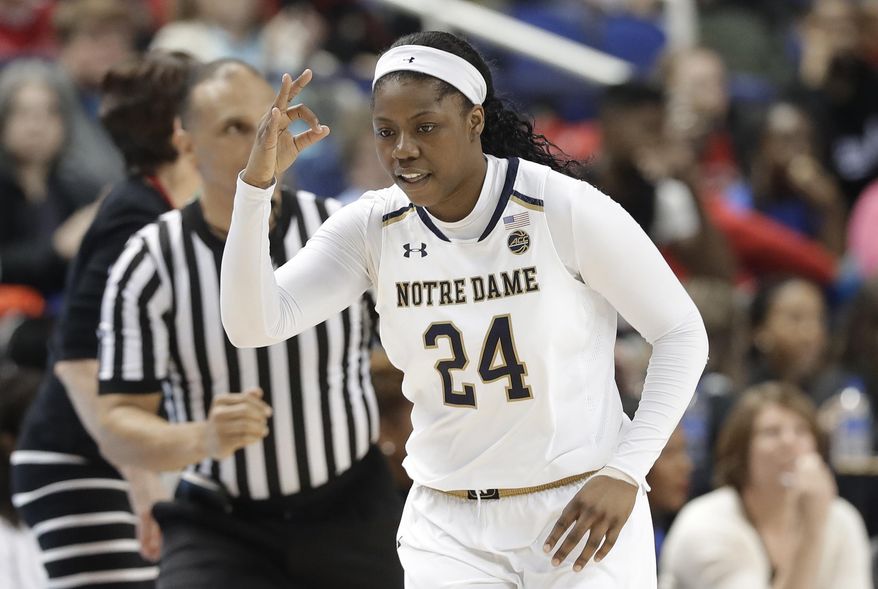 Notre Dame's Arike Ogunbowale (24) reacts after making a basket against Florida State during the second half of an NCAA college basketball game in the semifinals of the women's Atlantic Coast Conference tournament in Greensboro, N.C., Saturday, March 3, 2018. Notre Dame won 90-80. (AP Photo/Chuck Burton)