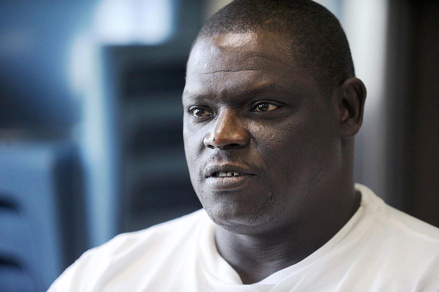 In this September 2016 photo, David Robinson poses for a portrait in the visiting area inside Jefferson City Correctional Center in Jefferson City, Mo. Robinson who has spent nearly two decades in prison for murder could soon be free, after a recent ruling tossing out his conviction. (Laura Simon/The Southeast Missourian via AP)