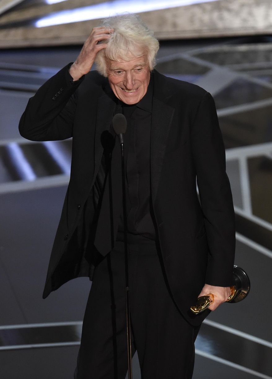 CORRECTS FILM TITLE TO BLADE RUNNER 2049 - Roger Deakins accepts the award for best cinematography for "Blade Runner 2049" at the Oscars on Sunday, March 4, 2018, at the Dolby Theatre in Los Angeles. (Photo by Chris Pizzello/Invision/AP)