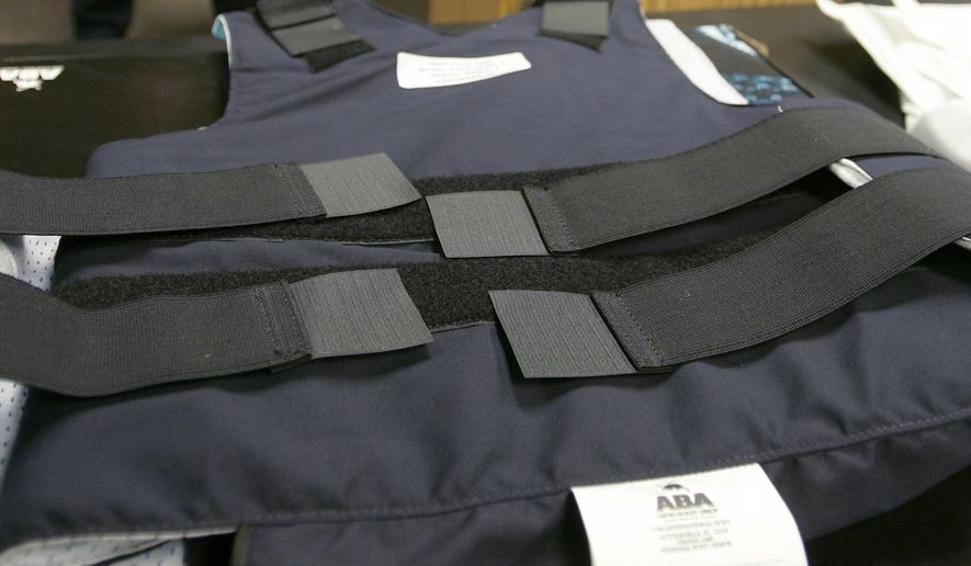 Houston police say a man who put on a bulletproof vest at a party has been killed after another man attending the party fired a shot at him. (Associated Press)