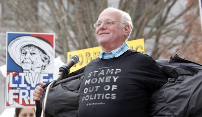 Ben Cohen of Ben and Jerry&#39;s Ice Cream, shows off his shirt during a rally for campaign finance overhaul at the Statehouse on Wednesday, Jan. 21, 2015, in Concord, N.H. Hundreds gathered after finishing a 300-mile walk to bring attention to the cause. (AP Photo/Jim Cole) ** FILE **