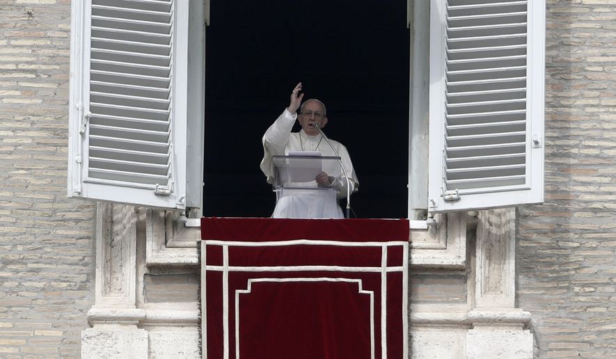 Pope Francis blesses faithful as he recites the Angelus noon prayer from the window of his studio overlooking St.Peter&#39;s Square, at the Vatican, Sunday, March 4, 2018. (AP Photo/Alessandra Tarantino)