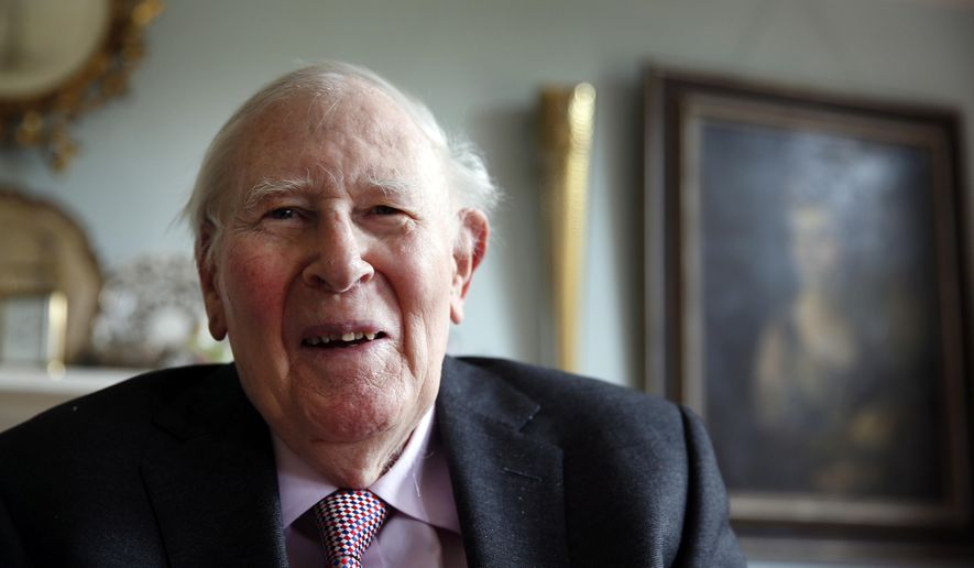 FILE- In this photo taken Monday, April 28, 2014, Roger Bannister, who as a young man was the first person to break the 4-minute barrier for the mile run in 1954, poses during an interview with The Associated Press at his home in Oxford, England. A statement released on behalf of Bannister's family said Sir Roger Bannister died peacefully in Oxford on March 3 2018, aged 88. (AP Photo/Lefteris Pitarakis, FILE)