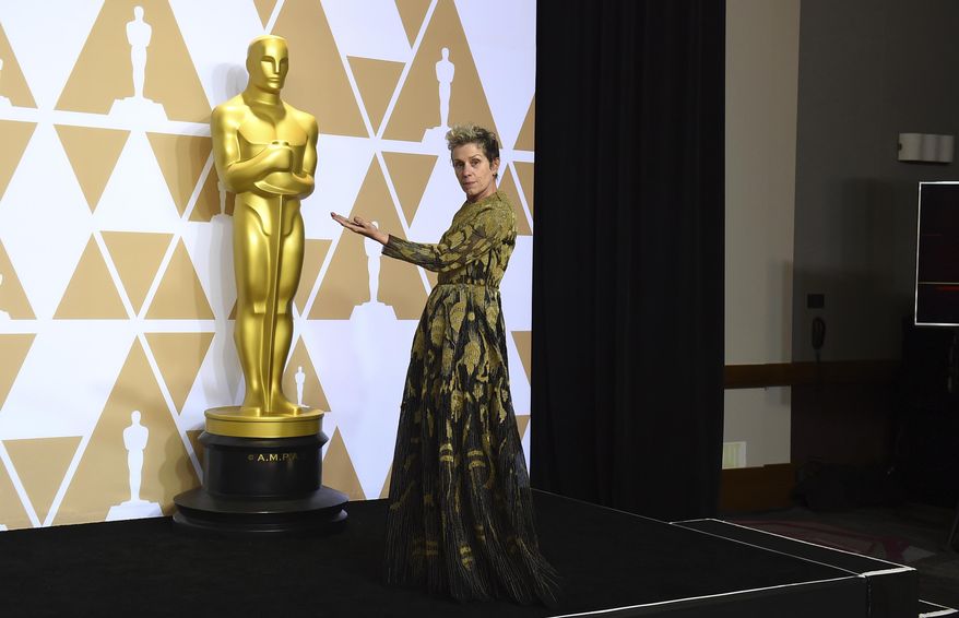 Frances McDormand, winner of the award for best performance by an actress in a leading role for "Three Billboards Outside Ebbing, Missouri", poses in the press room at the Oscars on Sunday, March 4, 2018, at the Dolby Theatre in Los Angeles. (Photo by Jordan Strauss/Invision/AP)