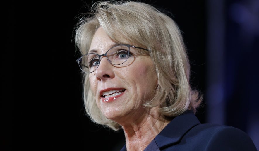 U.S. Education Secretary Betsy DeVos speaks during a dinner hosted by the Washington Policy Center, Friday, Oct. 13, 2017, in Bellevue, Wash. (AP Photo/Ted S. Warren) ** FILE **