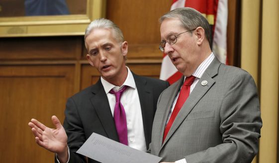 Rep. Trey Gowdy, R-S.C., left, speaks with Judiciary Committee Chairman Bob Goodlatte, of Virginia during a break in a hearing with Attorney General Jeff Sessions, on Capitol Hill, Tuesday, Nov. 14, 2017 in Washington. (AP Photo/Alex Brandon) ** FILE **
