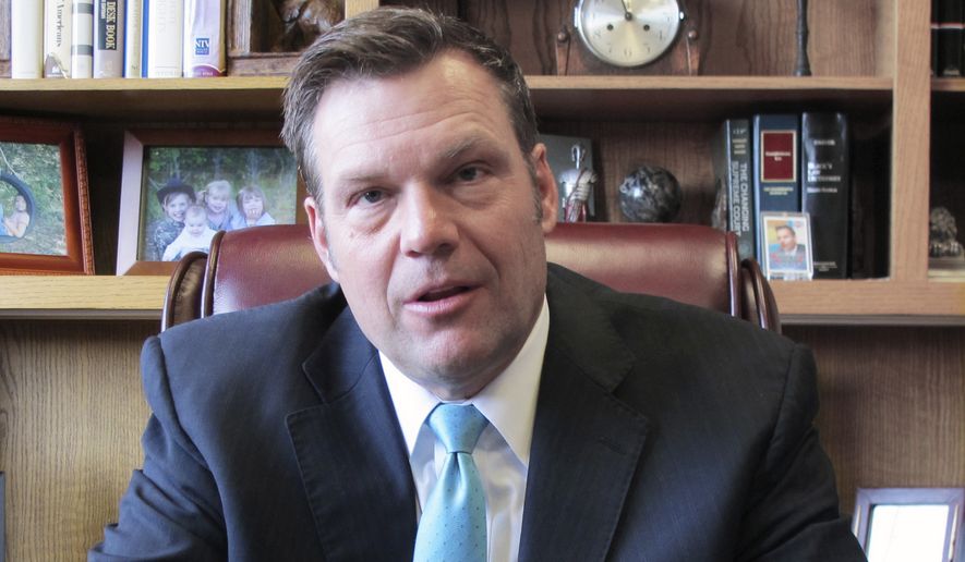 FILE - In this Jan. 4, 2018 photo, Kansas Secretary of State Kris Kobach speaks during an interview in Topeka, Kan. Legal challenges to a Kansas law requiring proof of citizenship to register to vote, will go on trial next week in a case with national implications for voting rights. At issue in a trial that begins Tuesday, March 6, 2018. is the fate of a Kansas law championed by Kansas Secretary of State Kobach. That law requires people to provide citizenship documents such as a birth certificate, naturalization papers or passport at the time they register to vote.(AP Photo/John Hanna)