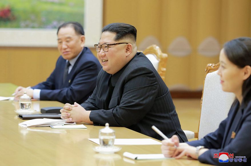 In this Monday, March 5, 2018 photo, provided by the North Korean government on March 6, North Korean leader Kim Jong Un, center, his sister Kim Yo Jong, and Vice Chairman of North Korea&#x27;s ruling Workers&#x27; Party Central Committee Kim Yong Chol meet members of South Korean delegation headed by National Security Director Chung Eui-yong in Pyongyang, North Korea. Independent journalists were not given access to cover the event depicted in this image distributed by the North Korean government. The content of this image is as provided and cannot be independently verified. Korean language watermark on image as provided by source reads: &quot;KCNA&quot; which is the abbreviation for Korean Central News Agency. (Korean Central News Agency/Korea News Service via AP)
