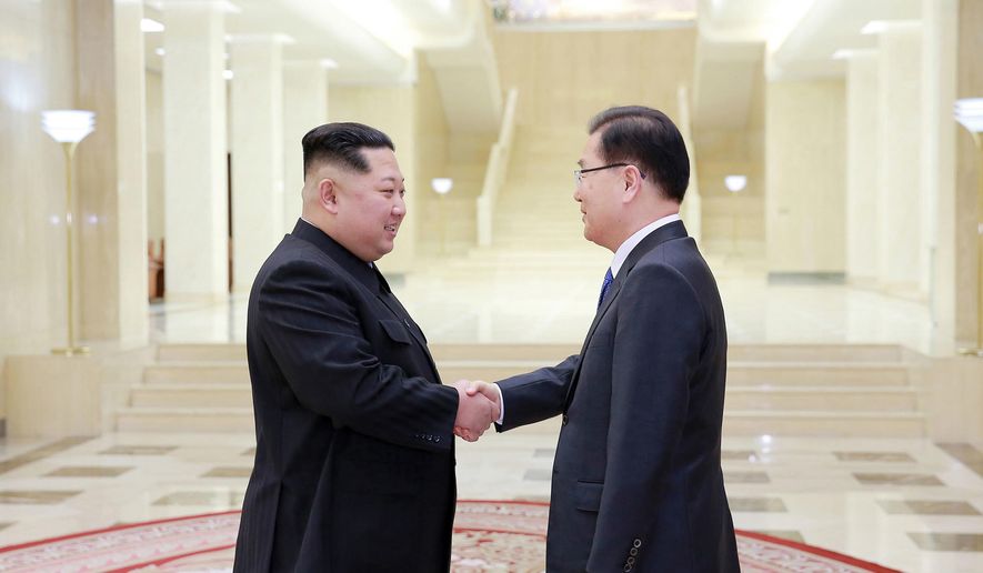 In this Monday, March 5, 2018 photo, provided by the North Korean government on March 6, North Korean leader Kim Jong-un, left, shakes hands with South Korean National Security Director Chung Eui-yong in Pyongyang, North Korea. Independent journalists were not given access to cover the event depicted in this image distributed by the North Korean government. The content of this image is as provided and cannot be independently verified. Korean language watermark on image as provided by source reads: &amp;quot;KCNA&amp;quot; which is the abbreviation for Korean Central News Agency. (Korean Central News Agency/Korea News Service via AP)