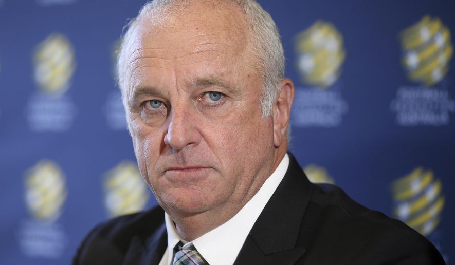 Graham Arnold attends a press conference where he will sign a four-year contract to coach the Australian national soccer team in Sydney, Thursday, March 8, 2018. Arnold, current coach of A-League champions Sydney FC, will replace Dutchman Bert van Marwijk after the World Cup in Russia. (AP Photo/Rick Rycroft)