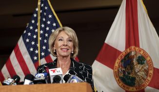 Secretary of Education Betsy DeVos speaks at a news conference following a visit to Marjory Stoneman Douglas High School in the aftermath of the Feb. 14 mass shooting at the school, Wednesday, March 7, 2018, in Coral Springs, Fla. (AP Photo/Lynne Sladky)