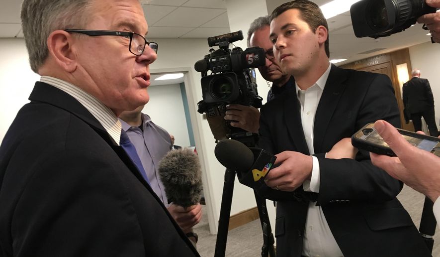 Democratic Rep. Dwayne Thompson of Cordova speaks to reporters at the Cordell Hull building in Nashville, Tenn., Wednesday, March 7, 2018, after a Republican-led legislative panel delayed consideration of his bill to ban bump stocks, then declined to let two survivors of the Las Vegas concert shooting testify. (AP Photo/Jonathan Mattise)