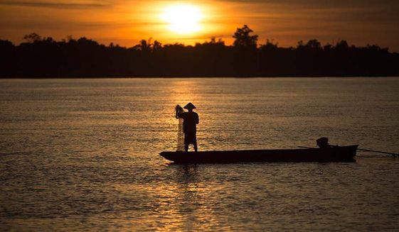 Sunset on the Mekong in Laos. (Laos official tourism Website)