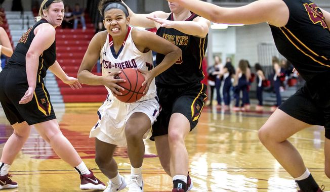 In this Nov. 17, 2017 photo, Colorado State University-Pueblo's Tuileisu Anderson (32) drives to the hoop during the first half of play of a college basketball game against Northern State at the Massari Arena in Pueblo, Colo. Anderson came to CSU-Pueblo four years ago as a brash point guard from Washington. Her skills were immediately noticeable and she played in 29 games as a true freshman on a team that was already established as a perennial power. Matt Weigand/The Pueblo Chieftain via AP)