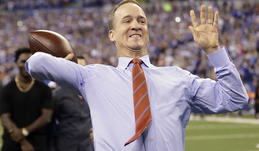 In this Oct. 8, 2017, file photo, former Indianapolis Colts quarterback Peyton Manning throws a pass during a halftime ceremony at an NFL football game between the Colts and the San Francisco 49ers in Indianapolis. The Colts retired Manning&#39;s jersey during the ceremony. (Associated Press) **FILE**