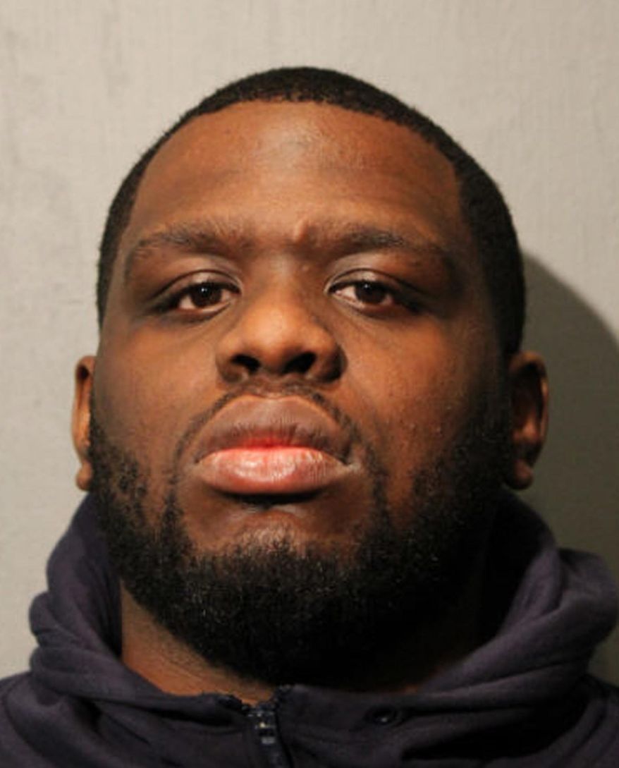 This photo provided by the Chicago Police Department shows Paris McKinley, Summit, Ill., who was charged after a Chicago police officer was dragged by a minivan for several blocks following a traffic stop. Police announced charges Thursday, March 8, 2018, against McKinley including aggravated fleeing, armed violence and being a parolee in possession of a weapon. (Chicago Police Department via AP)