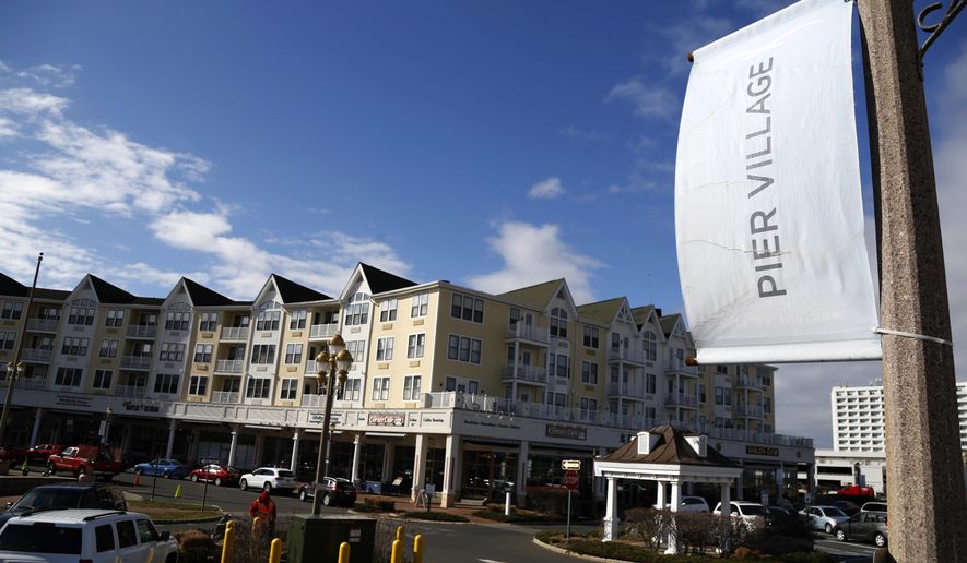 In this Monday, March 5, 2018 photo, the Pier Village development is seen in Long Branch, N.J. The federal government has been advising a beach town on the Jersey Shore on plans to build a pier and start a ferry service that would speed New Yorkers to the doorstep of a resort co-owned by Jared Kushner. (AP Photo/Seth Wenig)