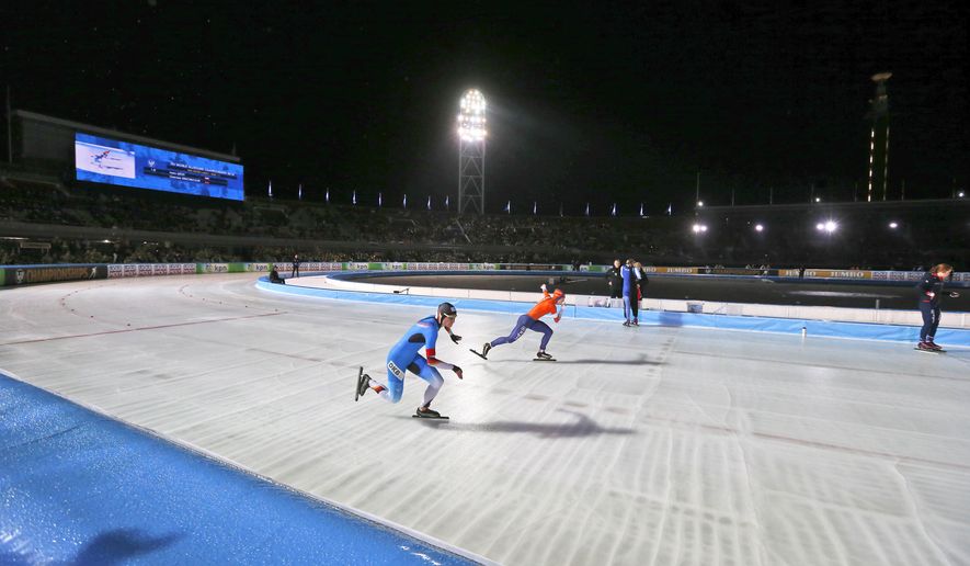 Gabriele Hirschbichler of Germany, left, and Ireen Wust of The Netherlands compete during the women's 500 meters race at the World Championships Speedskating Allround in the Olympic stadium in Amsterdam, Netherlands, Friday, March 9, 2018. (AP Photo/Peter Dejong)